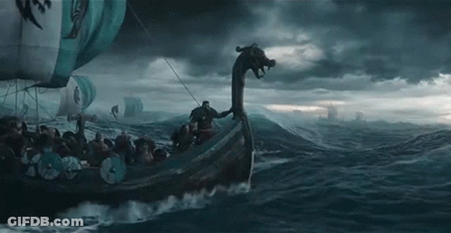 A Group Of Vikings Are Riding On The Back Of A Boat In The Ocean . GIF