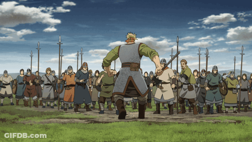 A Group Of Vikings Are Standing In A Field With Spears GIF