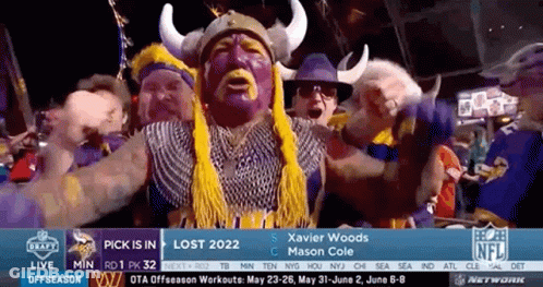 A Group Of Vikings Fans Are Watching A Game GIF