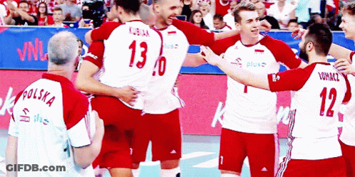 A Group Of Volleyball Players Are Hugging And One Has The Number 13 On His Jersey GIF