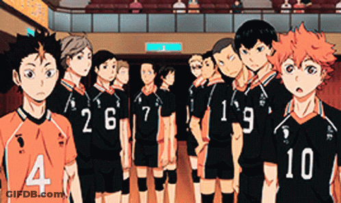 A Group Of Volleyball Players Standing Next To Each Other With Numbers 4 And 10 On Their Shirts GIF