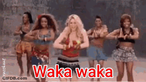 A Group Of Women Are Dancing In A Line With The Words Waka Waka Written Above Them GIF