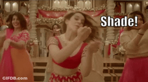A Group Of Women Are Dancing In A Room With The Words `` Shade '' Written On The Bottom . GIF