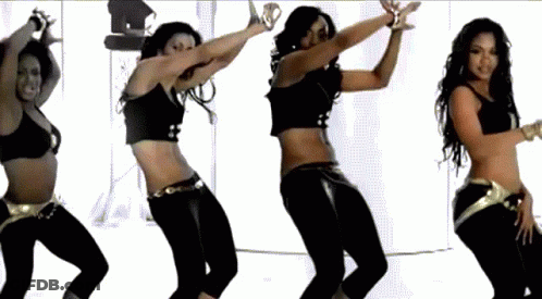 A Group Of Women Are Dancing In A Row GIF