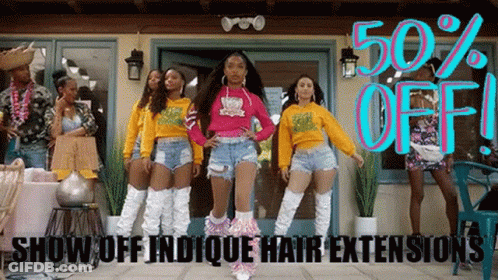 A Group Of Women Are Dancing In Front Of A Building With The Words `` Show Off Indicque Hair Extensions '' On The Bottom GIF