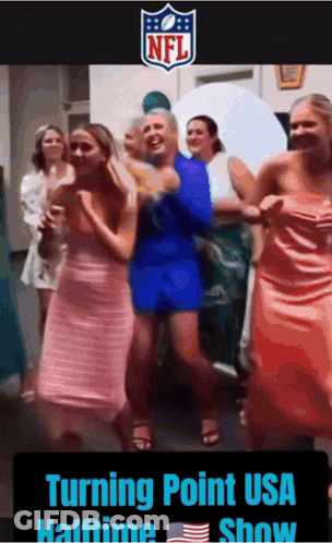 A Group Of Women Are Dancing In Front Of A Sign That Says Nfl GIF