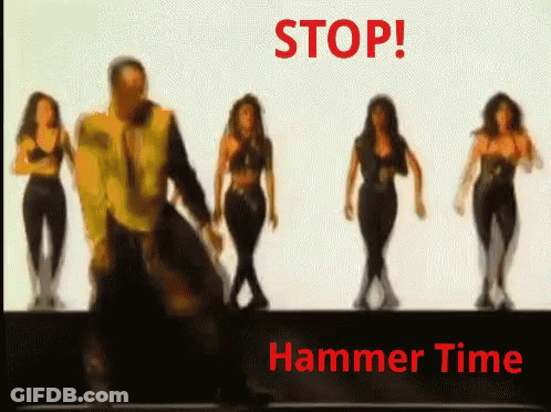 A Group Of Women Are Dancing In Front Of A Stop Sign GIF