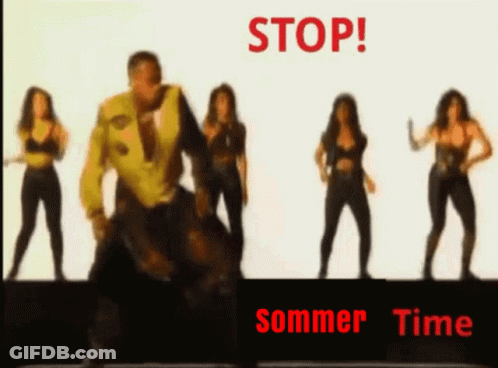 A Group Of Women Are Dancing In Front Of A Stop Sommer Time Sign GIF
