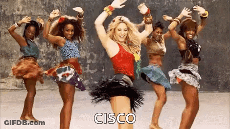 A Group Of Women Are Dancing Together In A Video With The Word Cisco On The Bottom . GIF