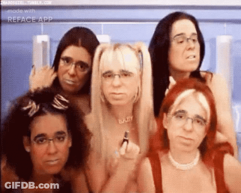 A Group Of Women Are Posing For A Picture And One Of Them Has The Name Lilly On Her Neck GIF