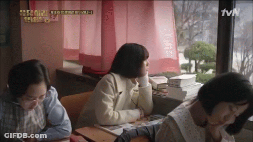 A Group Of Women Are Sitting In A Classroom With A Tvn Logo On The Bottom Right GIF