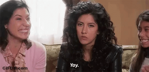 A Group Of Women Are Sitting On A Couch And One Of Them Is Talking . GIF