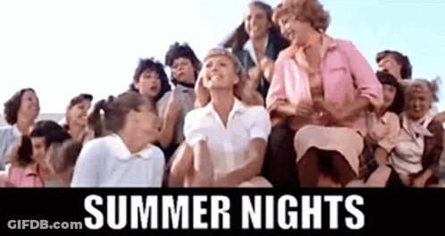 A Group Of Women Are Sitting On Top Of A Bleacher With The Words `` Summer Nights '' Above Them . GIF