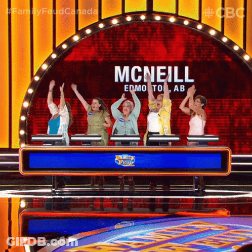A Group Of Women Are Standing In Front Of A Sign That Says Mcneill On It GIF