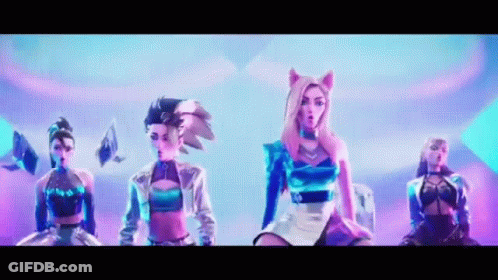 A Group Of Women Are Standing Next To Each Other On A Stage And Dancing . GIF