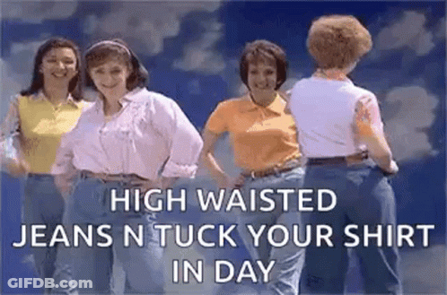 A Group Of Women Are Standing Next To Each Other Wearing Jeans N Tuck Your Shirt In Day . GIF
