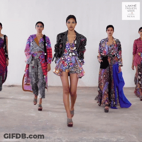 A Group Of Women Are Walking Down A Runway At The Lakme Fashion Week GIF