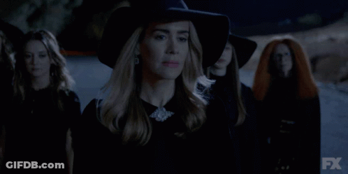 A Group Of Women Are Walking In The Dark With Fx Written On The Bottom Right GIF