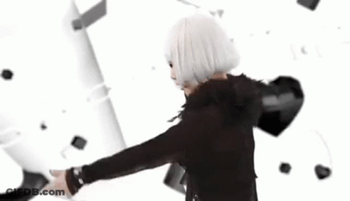 A Group Of Women In Black And White Dresses Are Walking In A Row GIF