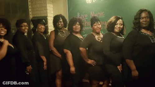 A Group Of Women Standing In Front Of A Sign That Says Five Music GIF