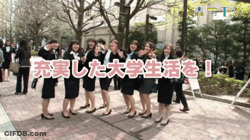 A Group Of Women Standing In Front Of A Sign That Says ' Tv ' GIF