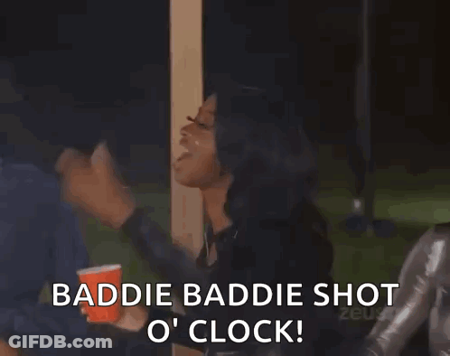 A Group Of Women Standing Next To Each Other Holding Cups And A Sign That Says Baddie Baddie Shot O Clock ! GIF