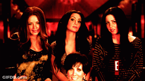 A Group Of Women Standing Next To Each Other With The Letter E On The Bottom GIF