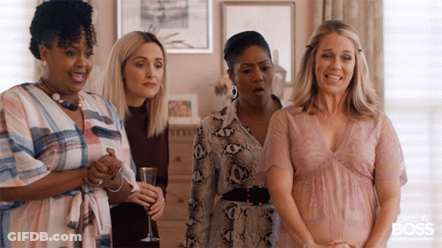 A Group Of Women Standing Next To Each Other With The Words Like A Boss On The Bottom Right GIF