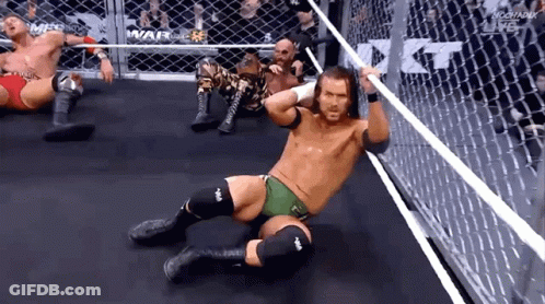 Wrestlers Laying On Ring Floor GIF