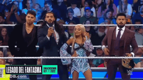 A Group Of Wrestlers Are Standing In A Ring With The Words Legado Del Fantasma On The Bottom GIF