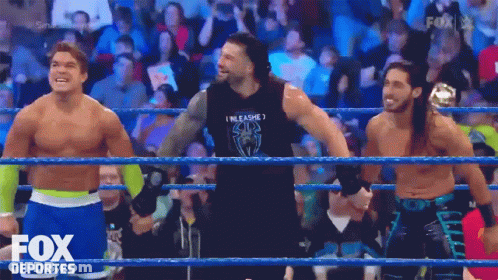 A Group Of Wrestlers Standing In A Ring With The Fox Deportes Logo On The Bottom Right GIF