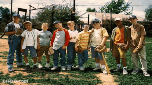 A Group Of Young Boys Are Posing For A Picture While Wearing Ny Hats GIF