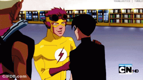 A Group Of Young Justice Characters Are Standing Together GIF
