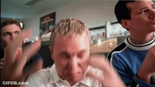 A Group Of Young Men Are Clapping And One Of Them Has A Piercing On His Nose GIF