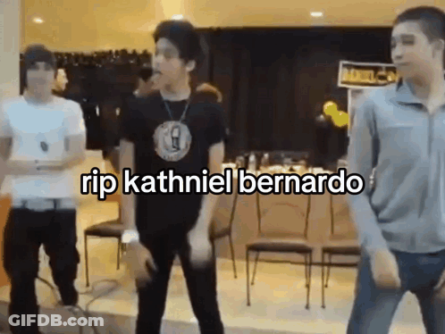 A Group Of Young Men Are Dancing In A Room With The Words `` Rip Kathniel Bernardo '' Written Above Them . GIF