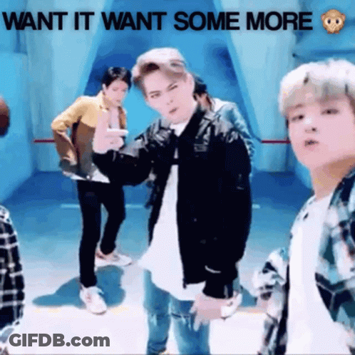 A Group Of Young Men Are Dancing In A Room With The Words Want It Want Some More Written Above Them GIF