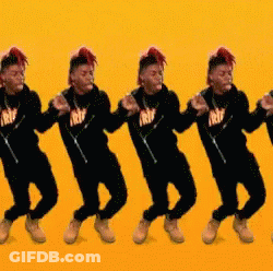 A Group Of Young Men Are Dancing In A Row Wearing Black Shirts That Say Trw On Them GIF