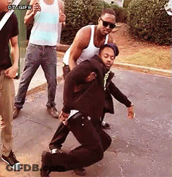 A Group Of Young Men Are Dancing On The Sidewalk With A Watermark That Says Dt-GIFs On The Bottom GIF