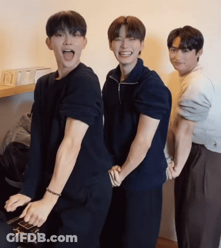 A Group Of Young Men Are Posing For A Picture And One Of Them Has A Bracelet On His Wrist GIF