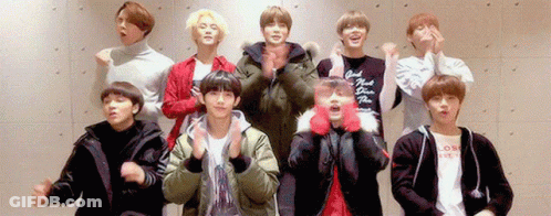 A Group Of Young Men Are Posing For A Picture And One Of Them Is Wearing A Shirt That Says ' Good Night ' GIF