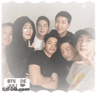 A Group Of Young Men Are Posing For A Picture And The Words Bts De Juli Are On The Bottom GIF