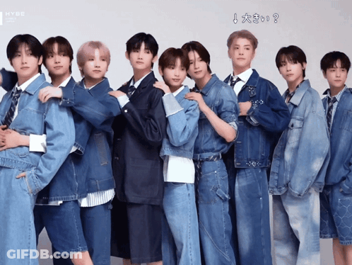 A Group Of Young Men Are Posing For A Picture And The Words Hybe Are On The Bottom GIF