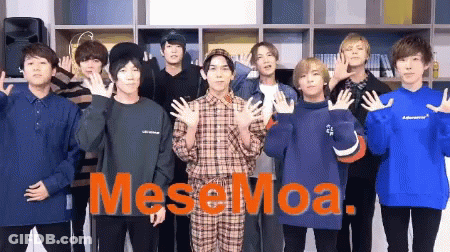 A Group Of Young Men Are Posing For A Picture With The Word Mesemoa On The Bottom Right GIF