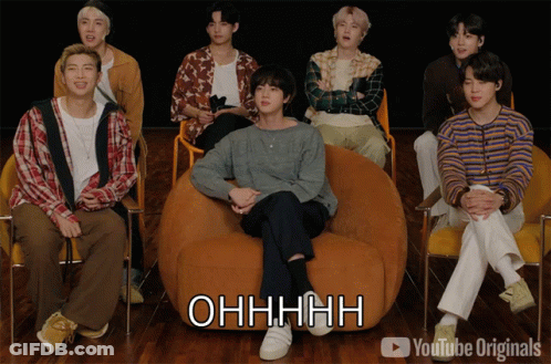 A Group Of Young Men Are Sitting In Chairs And One Of Them Is Sitting On A Bean Bag Chair And Says Ohhhhh GIF