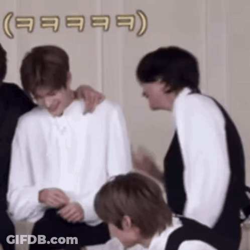 Group Of Young Men Sitting Next To Each Other GIF