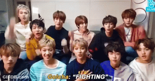 A Group Of Young Men Are Sitting On A Couch And One Of Them Is Talking About Fighting . GIF