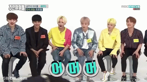 A Group Of Young Men Are Sitting On Stools And One Of Them Is Wearing A Name Tag That Says ' A ' GIF