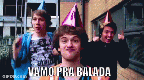 Young Men With Party Hats Vamo Pra Balada GIF