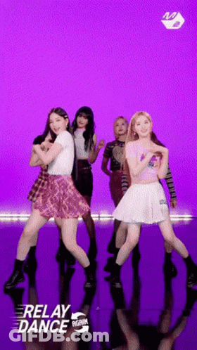 A Group Of Young Women Are Dancing In Front Of A Purple Background That Says Relay Dance On It GIF