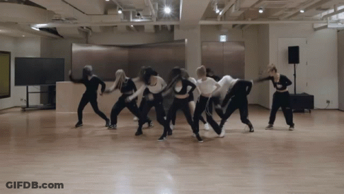 A Group Of Young Women Are Dancing Together In A Dance Studio GIF